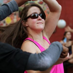 (Boston, MA - 7/20/15) Kerry Thompson, founding director of Silent Rhythms, teaches a salsa lesson for Deaf high school students [not allowed to appear in photos] during Salsa in the Park in the South End, Monday, July 20, 2015. Staff photo by Angela Rowlings.